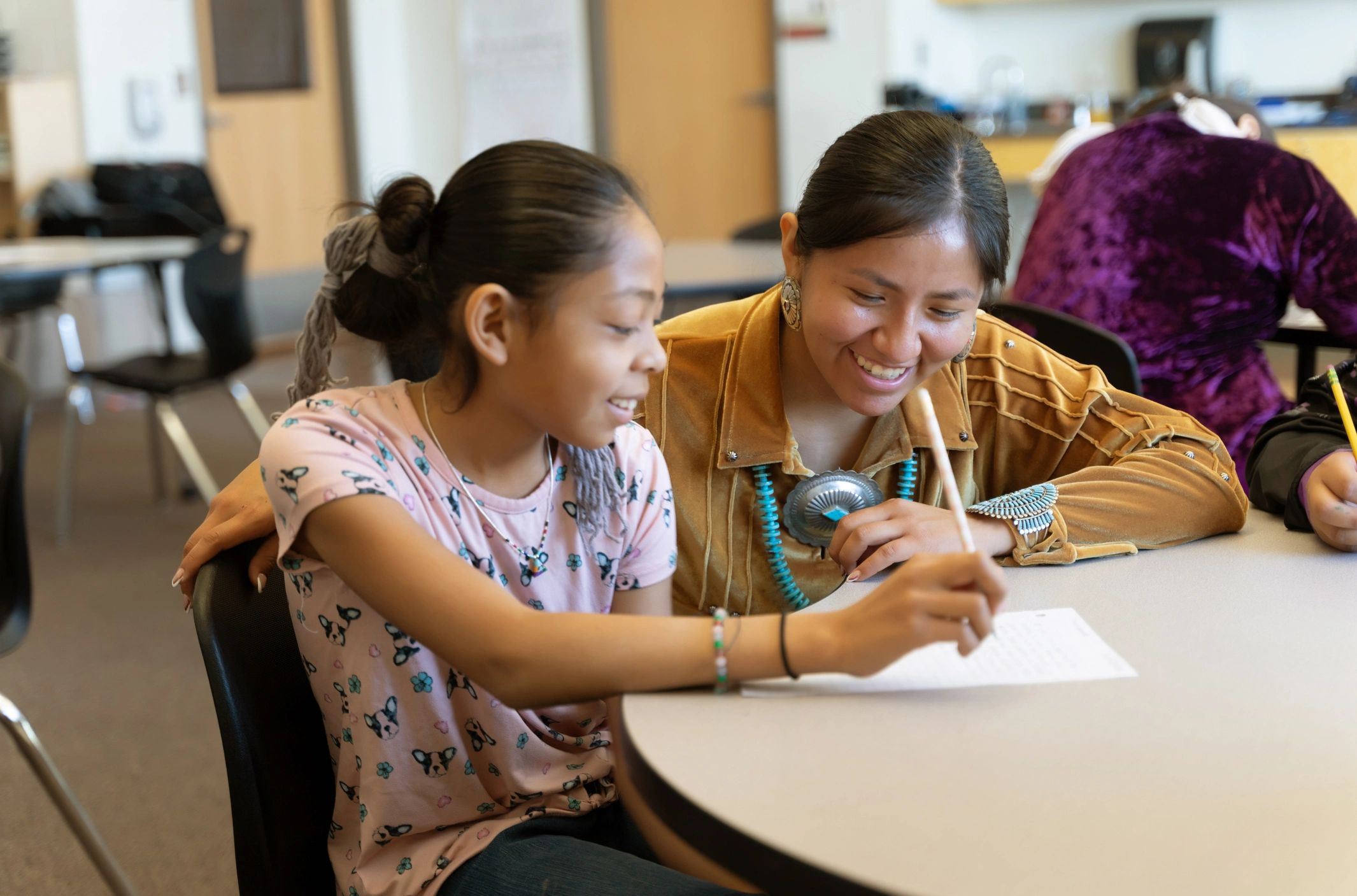 Tutor working one-on-one with a student